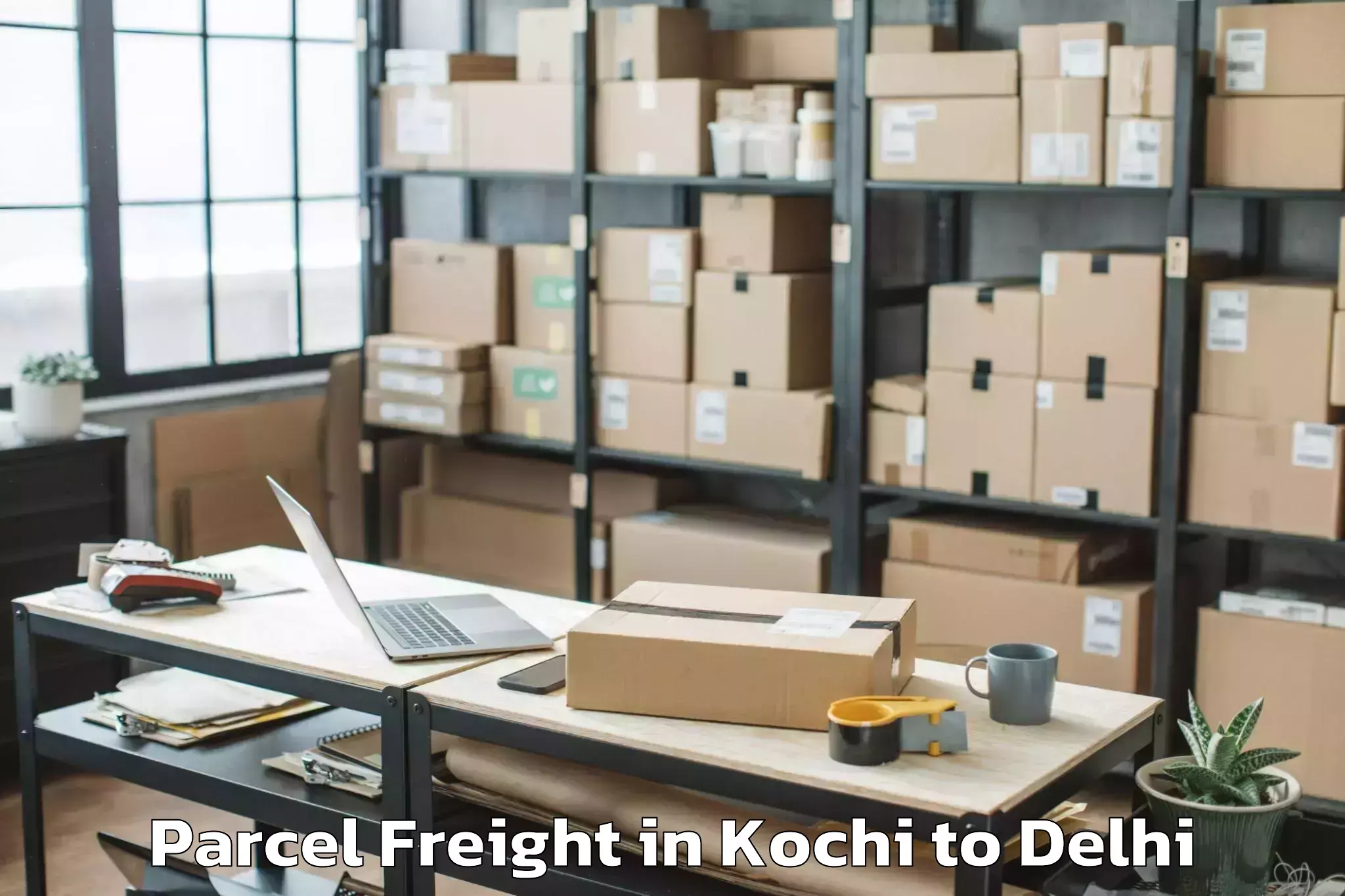 Book Kochi to Vivek Vihar Parcel Freight Online